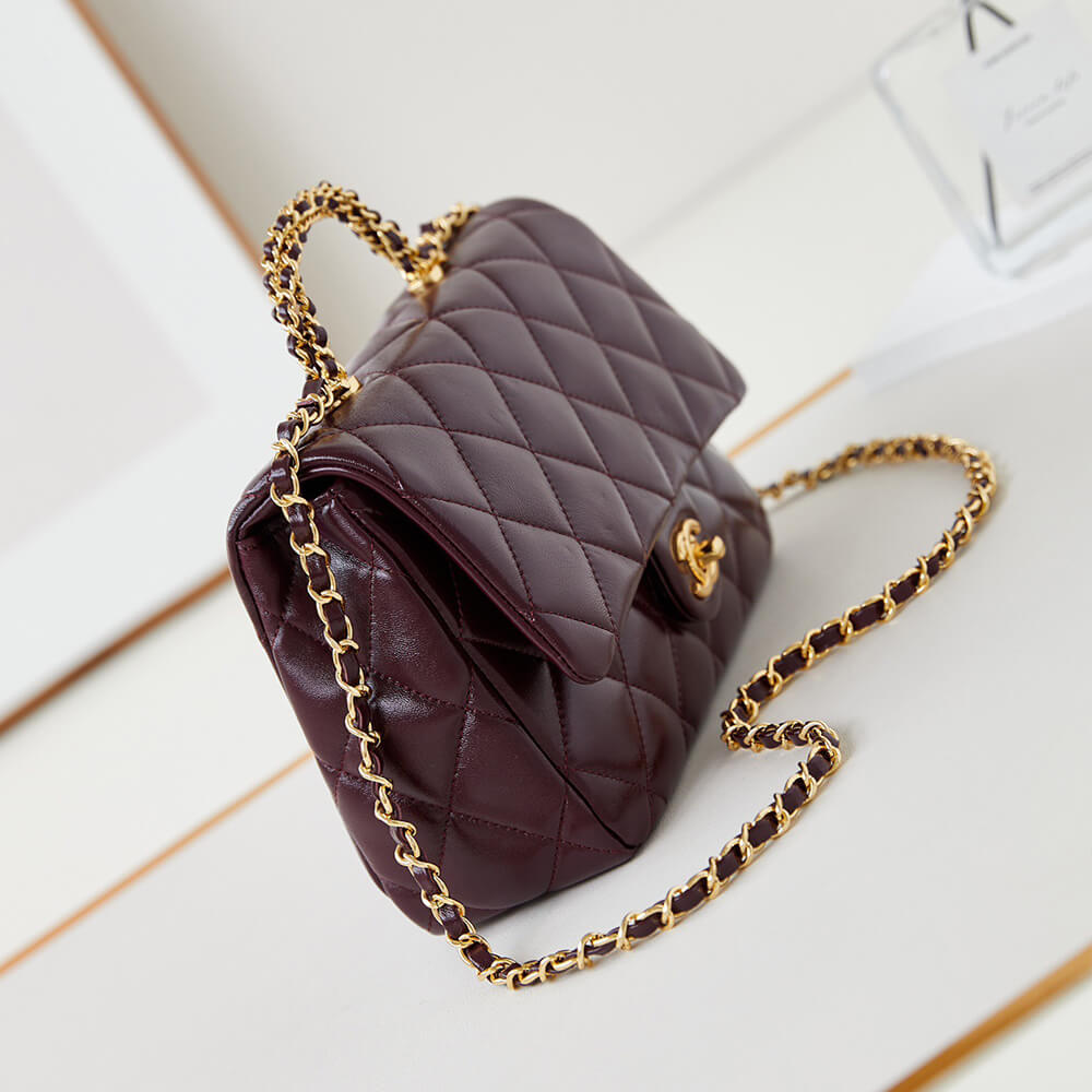 Ch*el flap bag with top handle