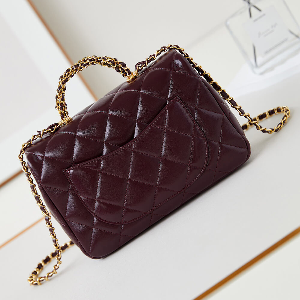 Ch*el flap bag with top handle