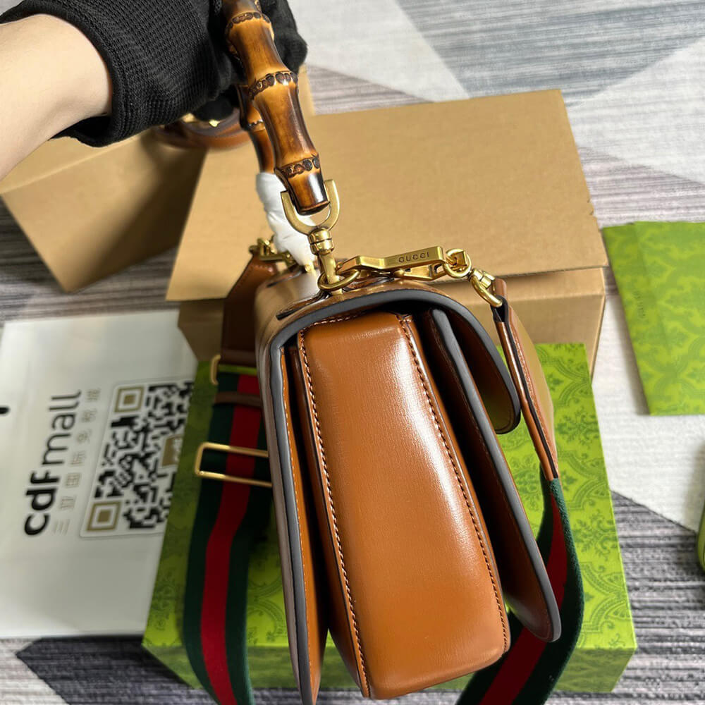 G*u*i bamboo 1947 medium top handle bag